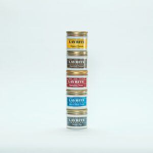 Stacked Layrite hair pomade tins